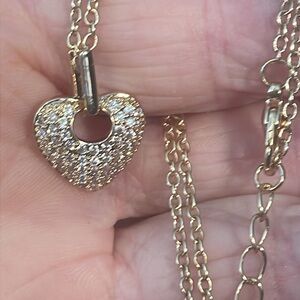 Heart necklace maker unknown.
Crystals on heart set in 14k Yellow Gold Plate